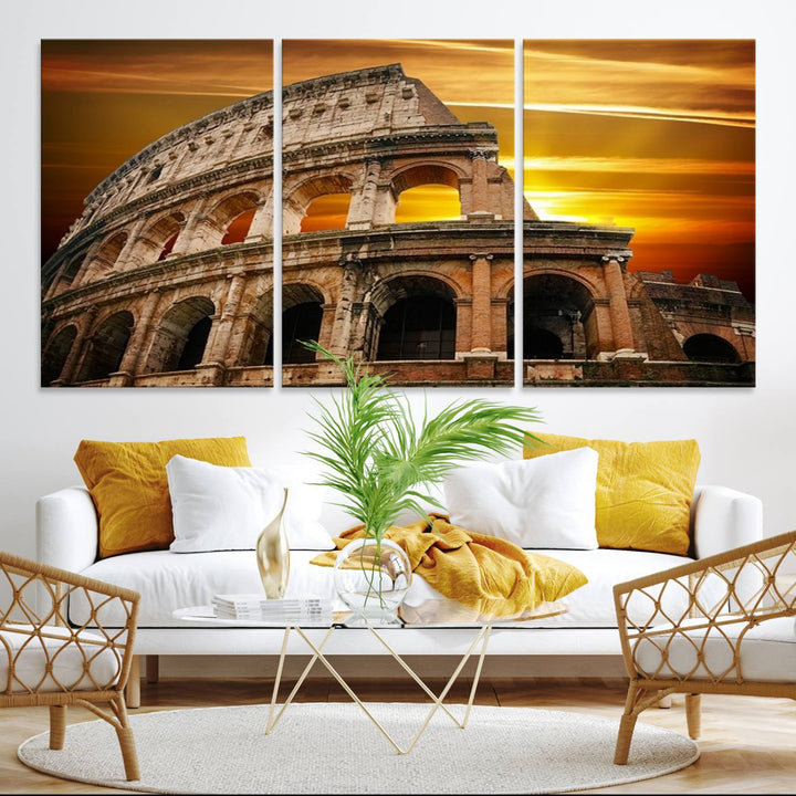 On the wall, theres a piece of art titled Colosseum with Yellow Sunset Behind, Italy.