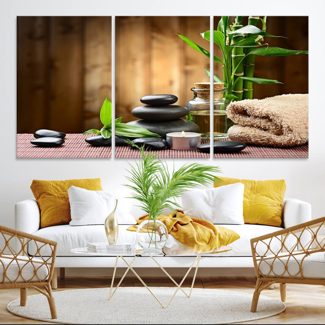 Zen Serenity Triptych Canvas Art: Pink Lotus Flower and Stones, Tranquil Water Lily Print, creating a peaceful spa ambiance.