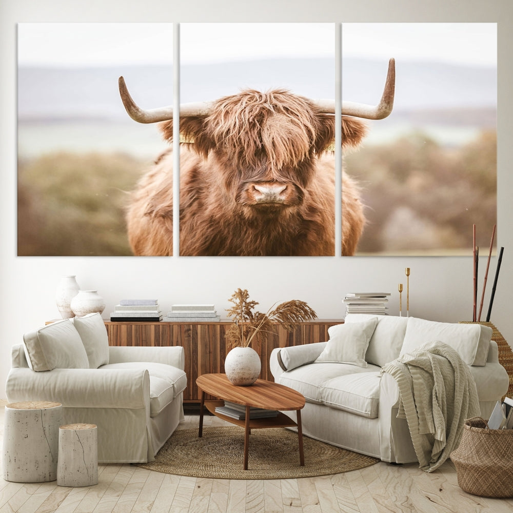 Canvas wall art featuring a Highland cow with long, shaggy fur in natural pastel tones, ready to hang.