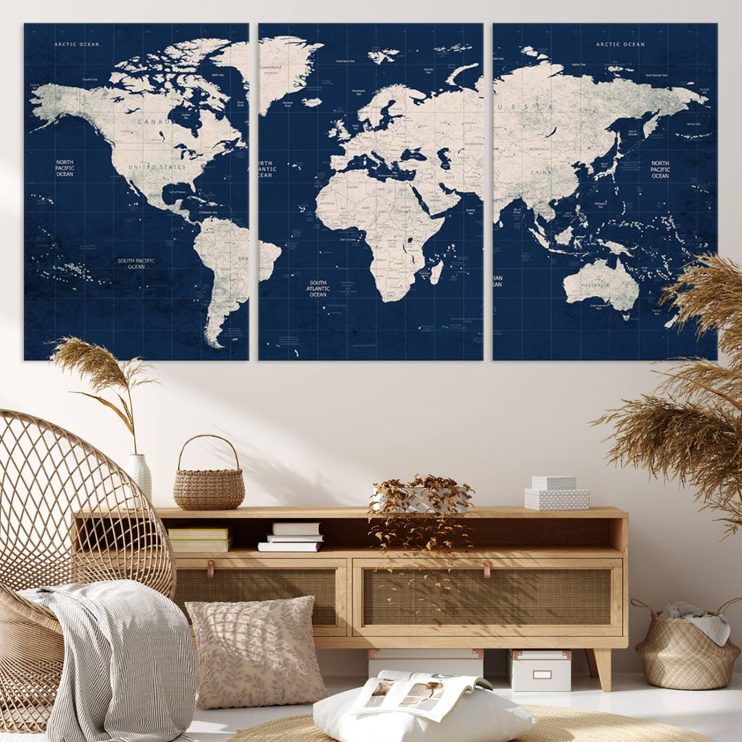 Large modern world map wall art canvas print in beige and navy; showcases a 3-panel vintage map design and is ready to hang.