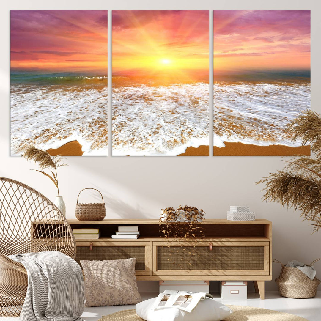 Golden Beach Sunrise 3-panel canvas art of ocean waves, hung on a wooden wall.