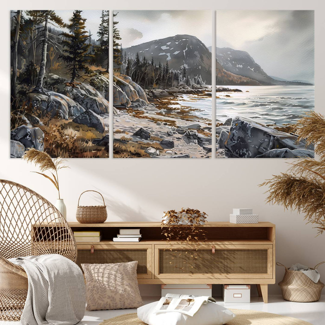 Framed wall art depicting Acadia National Parks rocky coast, trees, mountains, and sunlight over the sea; ready to hang.