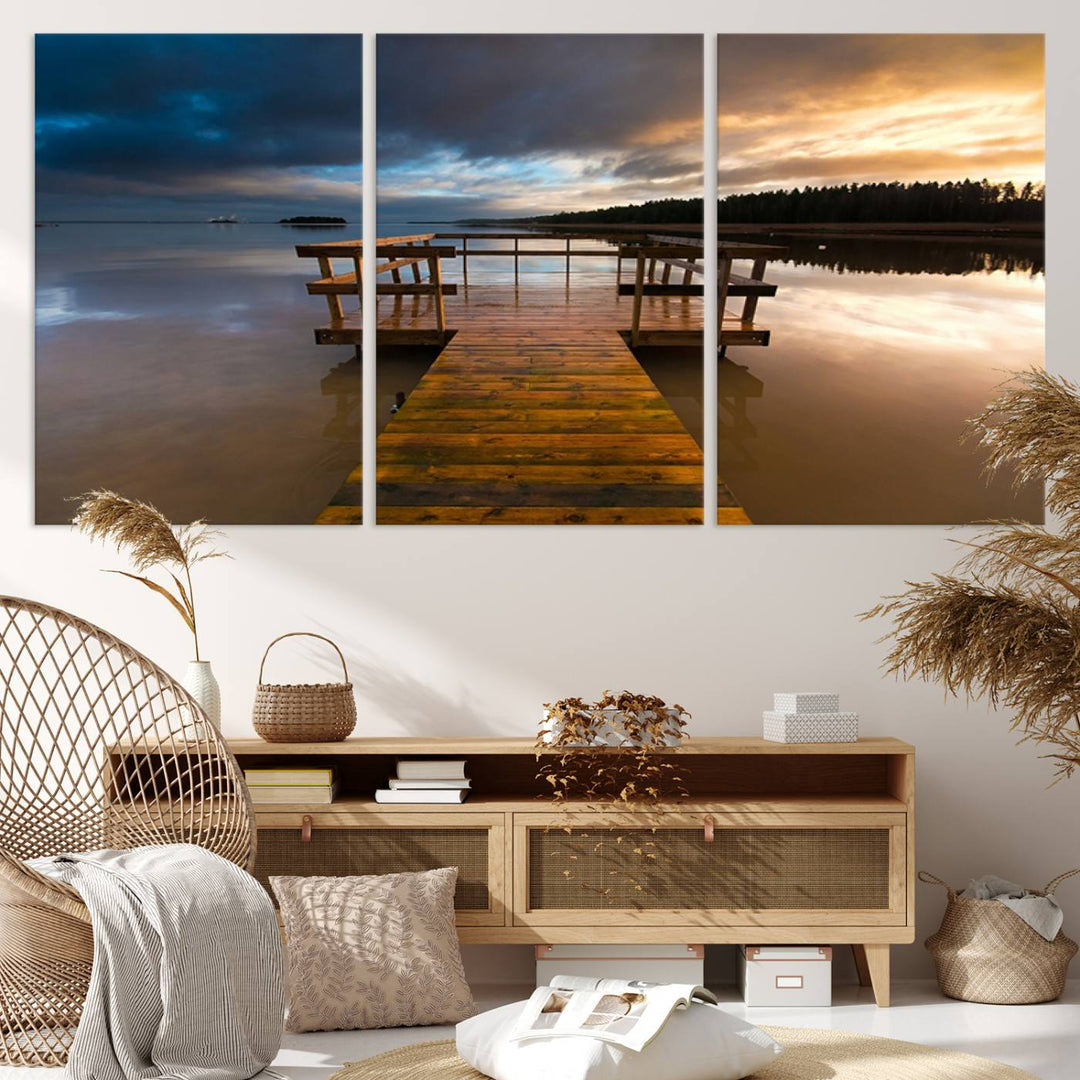 The "Serene Lake Pier at Sunset" landscape canvas print, crafted as ready-to-hang and framed wall art, enriches the contemporary setting by capturing the tranquility of a lakeside pier at sunset.