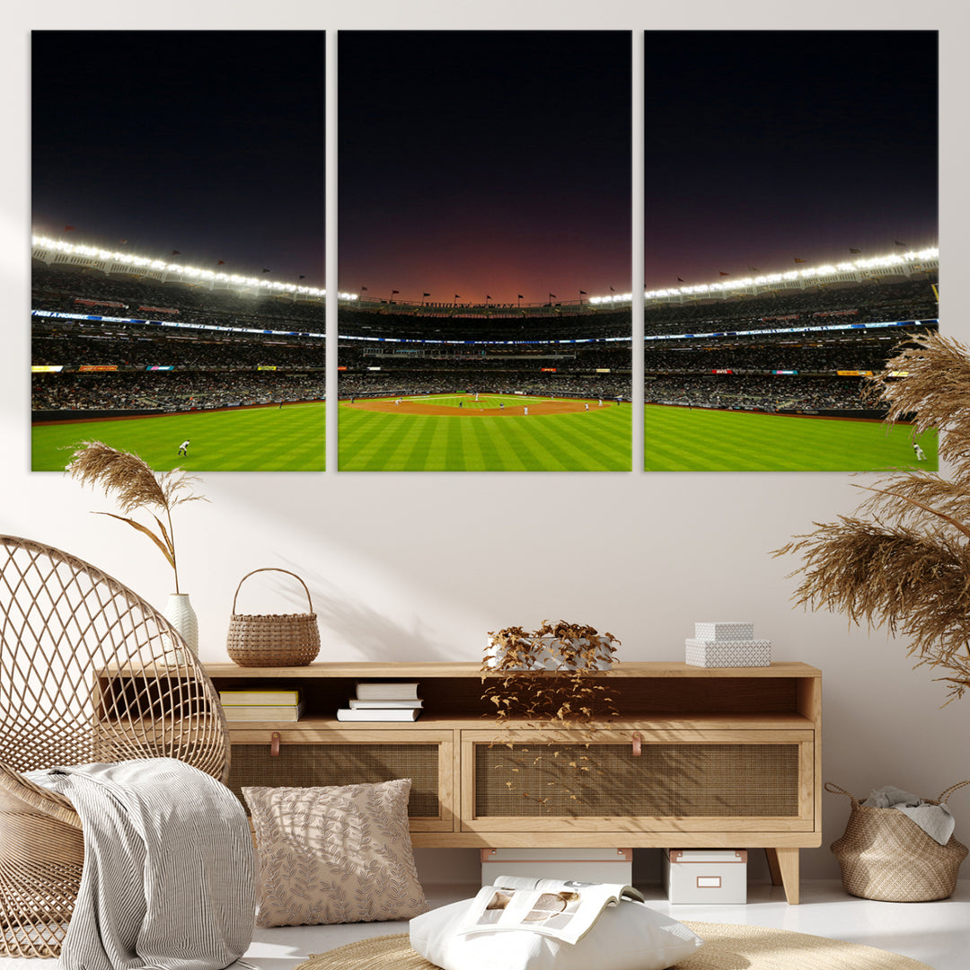 A night game at Yankee Stadium depicted on canvas beneath a sunset sky.