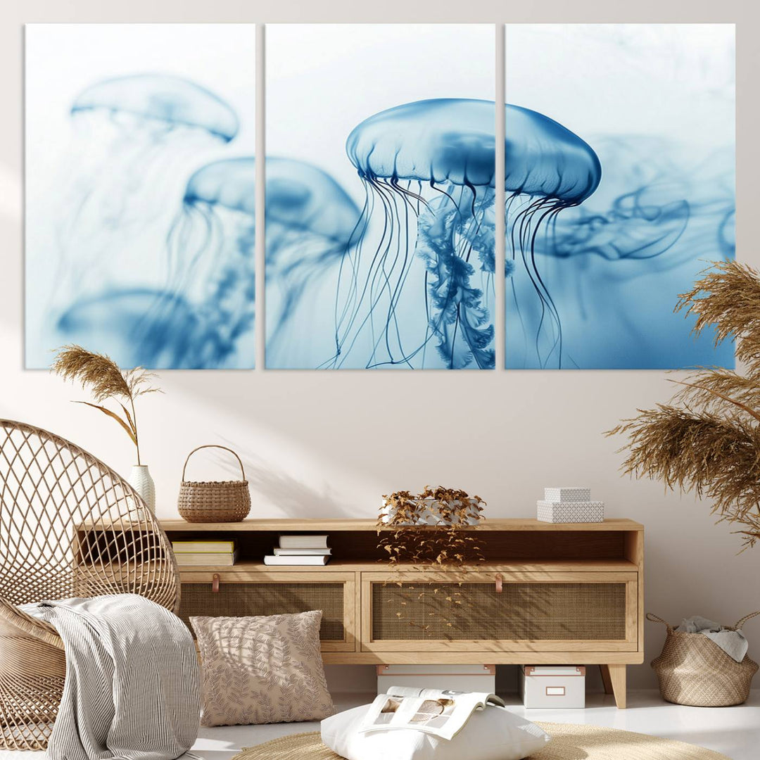 A breathtaking triptych of the Blue Jellyfish Wall Art Canvas Print decorates the space, beautifully highlighted by an overhead lamp. Each canvas is created on museum-quality material using high-resolution printing and includes a UV-protective coating to ensure long-lasting vibrancy.