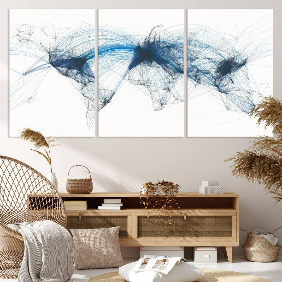 The Aviation Flight Map Wall Art is a set of three abstract panels featuring a world map with blue lines, resembling a flight map. Ideal for aviation enthusiasts, this ready-to-hang framed air traffic art print enhances the appeal of modern decor.