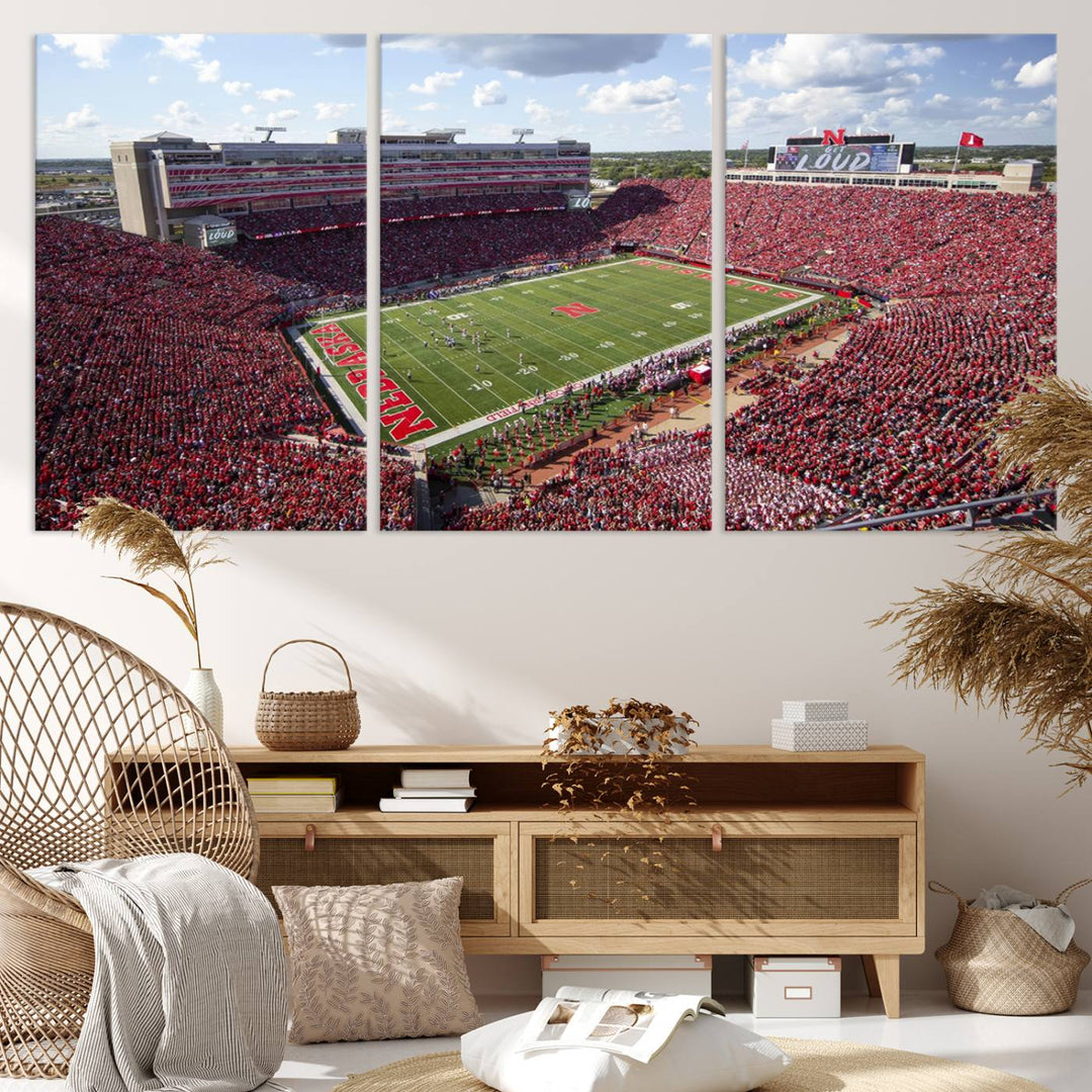 The University of Nebraska Cornhuskers Football Team Print showcases a vibrant triptych of Lincoln Memorial Stadium, depicting a packed football stadium filled with energetic fans. This handmade art piece is crafted in the USA and printed on premium canvas for a gallery-quality finish.