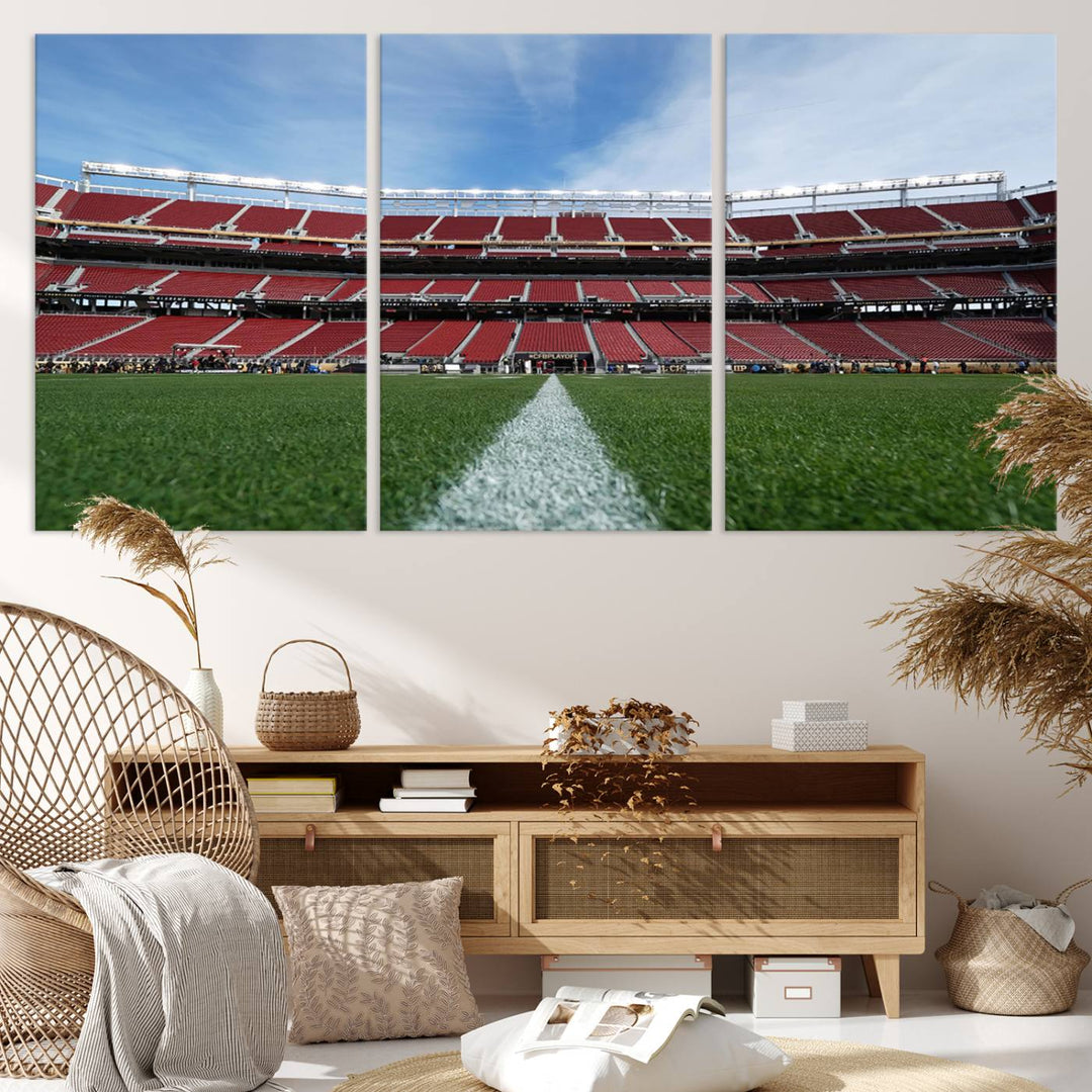 A canvas print of the University of Tulsa Golden Hurricane showcases H.A. Chapman Stadiums football field and red seats against a backdrop of a blue sky.