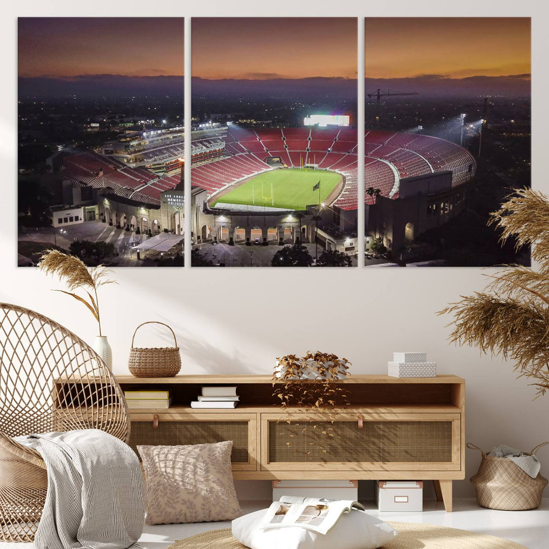 The USC Trojans Stadium canvas captures Memorial Coliseum at twilight, showcasing red seats and a green field beneath an orange sky.