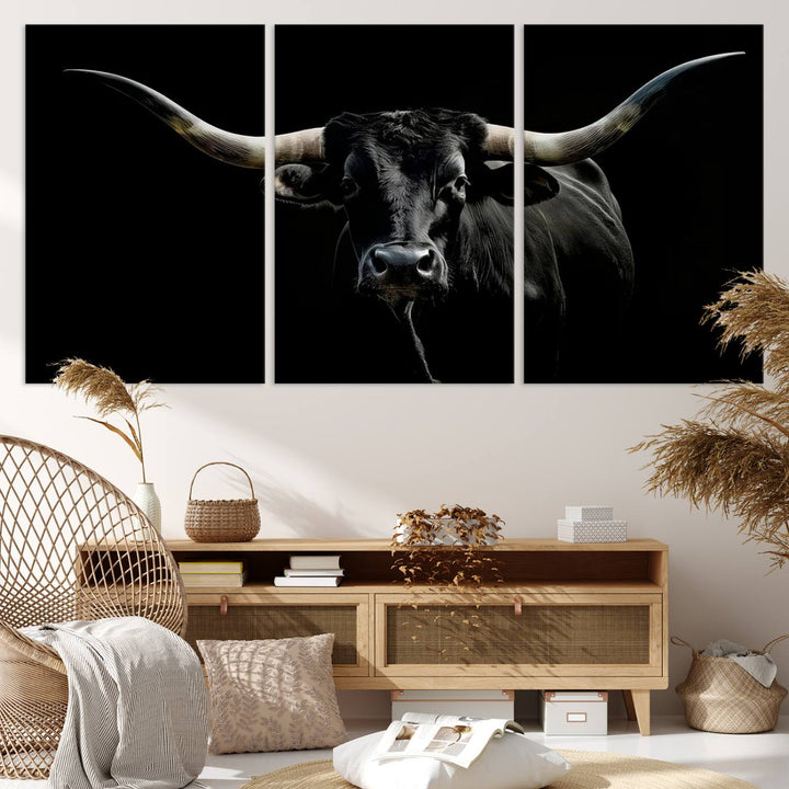 The Texas Black Longhorn Bull Canvas Print, featuring large curved horns set against a dark background, is ideal for Western decor.