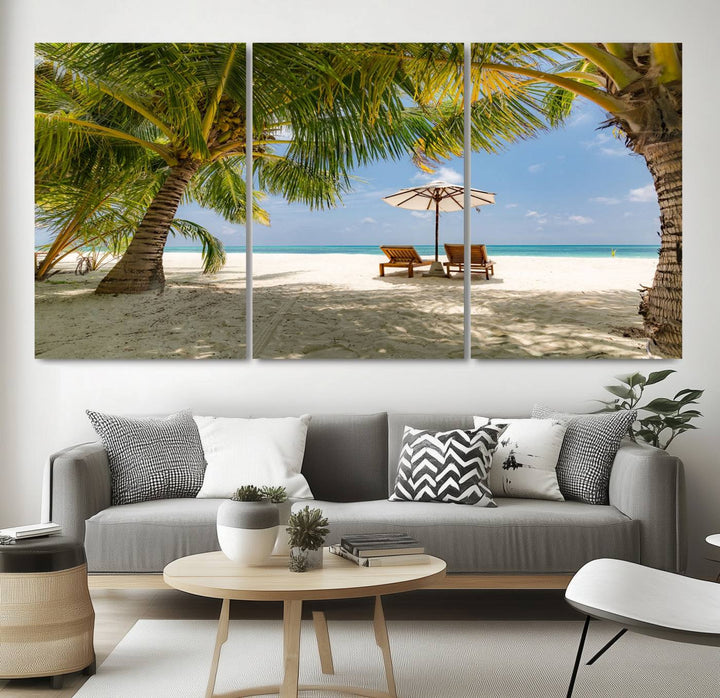 The canvas art print titled Lounge Chairs Palm Trees on Tropical Beach offers free shipping.