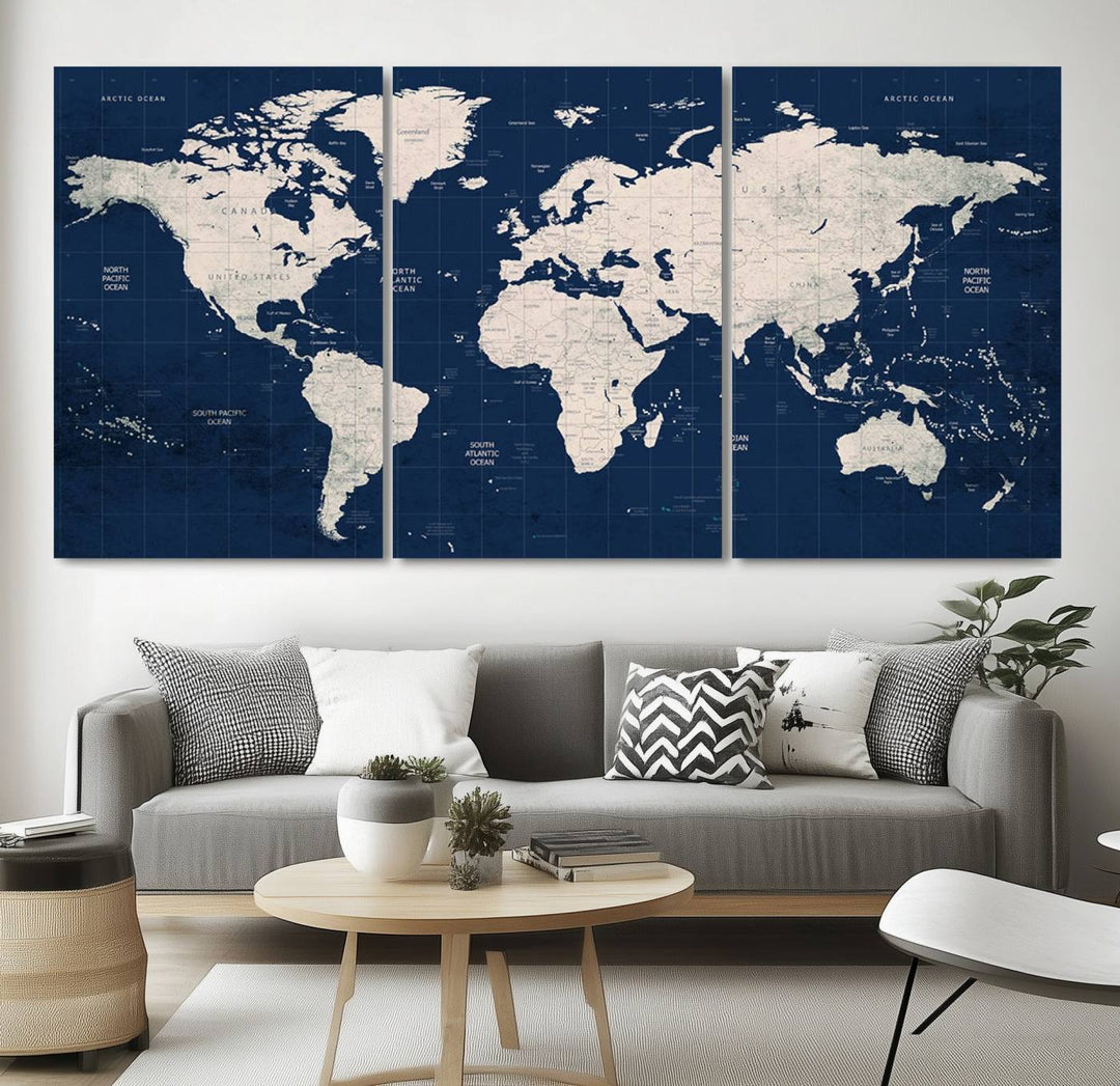 Large modern world map wall art canvas print in beige and navy; showcases a 3-panel vintage map design and is ready to hang.