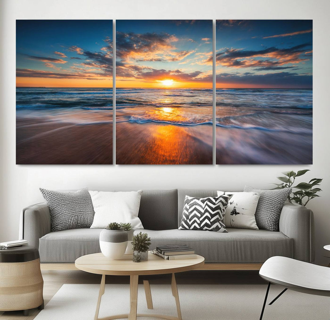 The Sunset on the Ocean canvas adds coastal ambiance to the wooden wall.