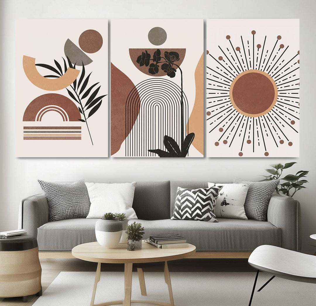 A trio of Boho Wall Art Canvas Print Sets, showcasing mid-century and bohemian styles on museum-quality canvas, adorn the wall.