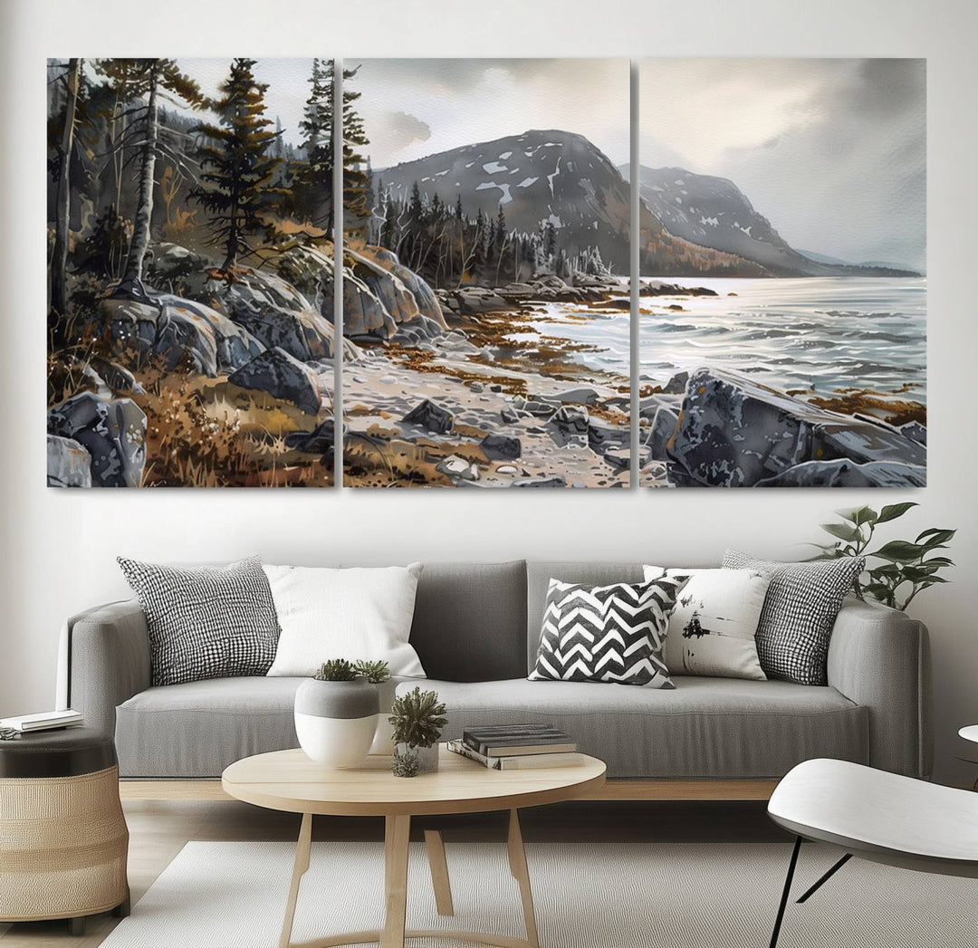 Framed wall art depicting Acadia National Parks rocky coast, trees, mountains, and sunlight over the sea; ready to hang.