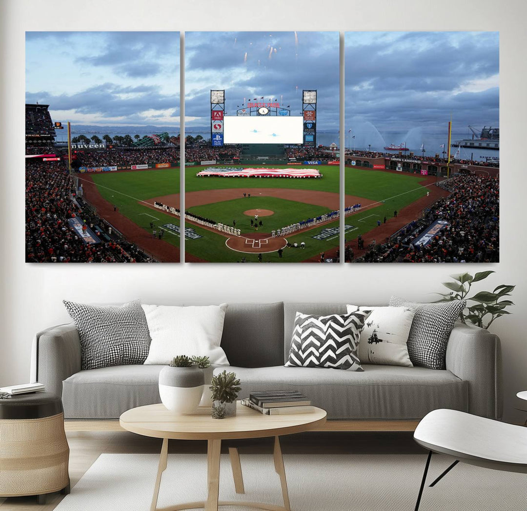 This framed 3-panel canvas MLB wall art features a giant flag and fans under a cloudy sky at Oracle Park.