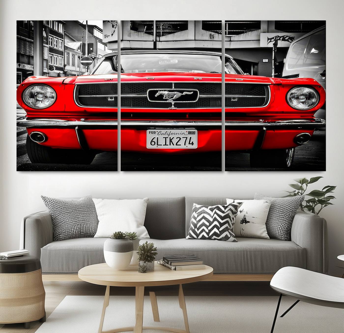 Front view of a bold red 1960s Ford Mustang parked in an urban environment, captured in dramatic contrast with a black-and-white city backdrop, emphasizing its timeless American muscle car identity.