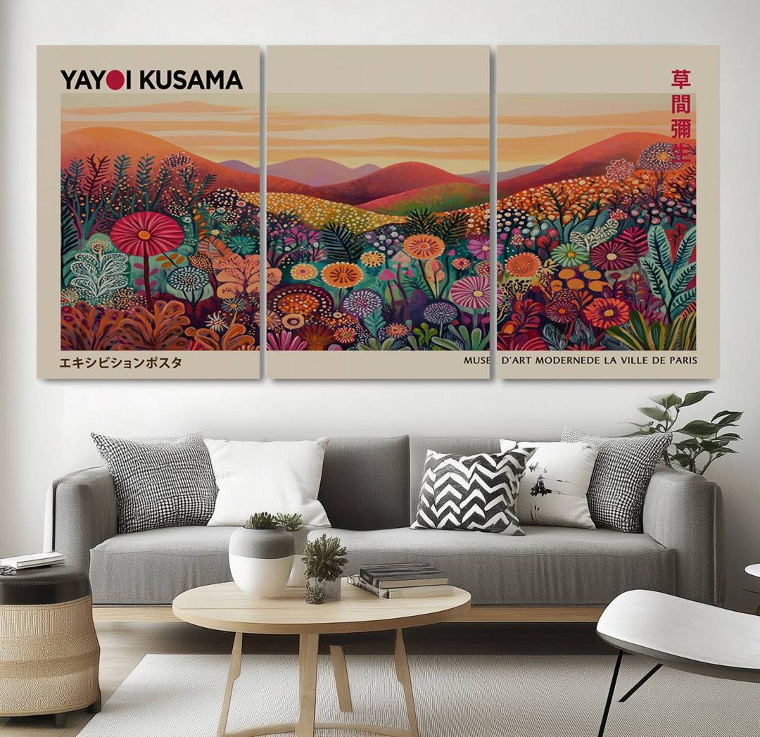 The room is adorned with a triptych artwork depicting colorful flowers and hills, incorporating the "Framed Yayoi Kusama 1986 Wall Art Print" – a vibrant abstract landscape canvas print that blends Japanese Wabi Sabi themes into contemporary nature-inspired décor.