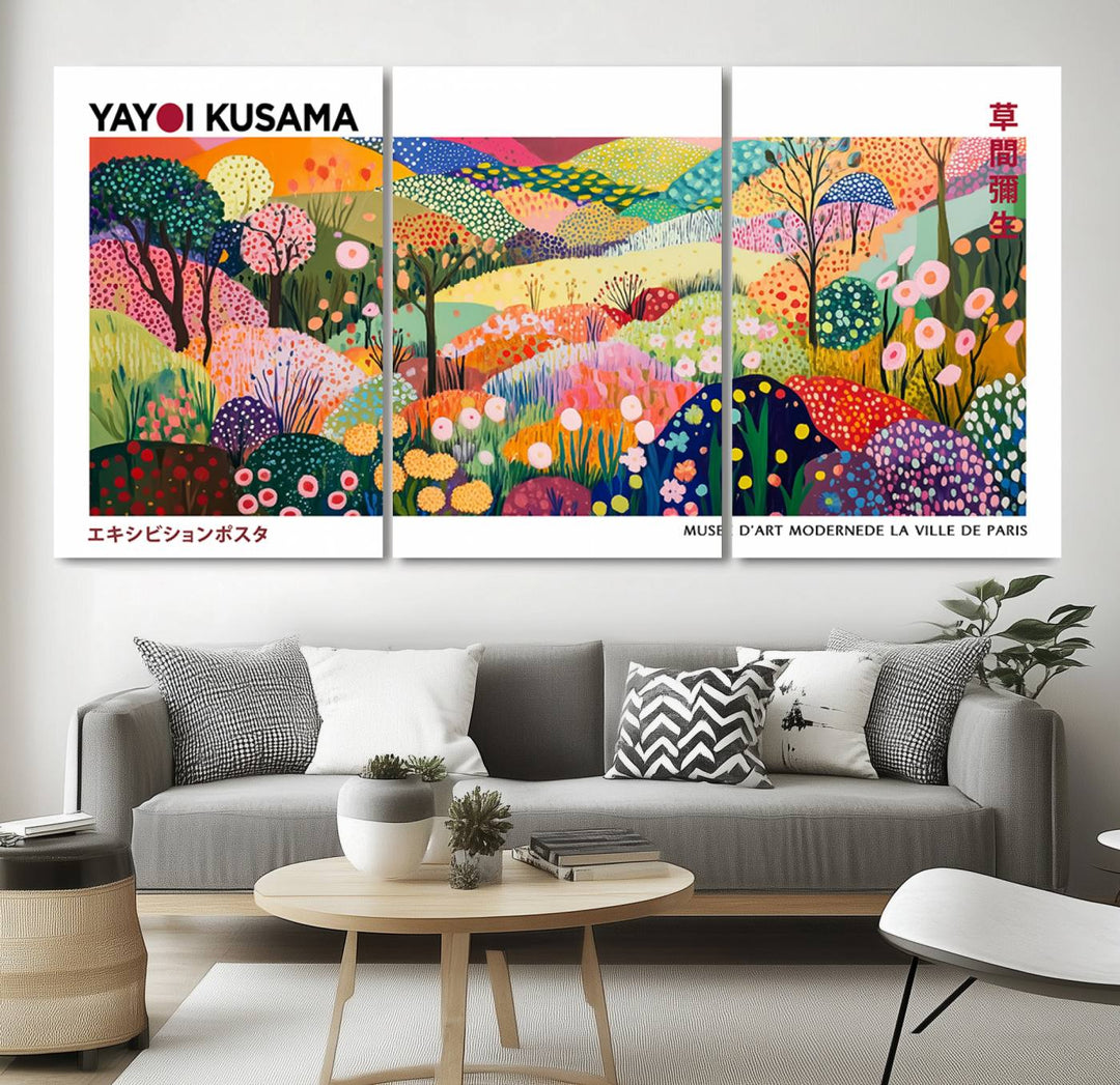 Three vibrant, abstract Yayoi Kusama wall art prints adorn a black wall, creating a perfect blend of contemporary décor.