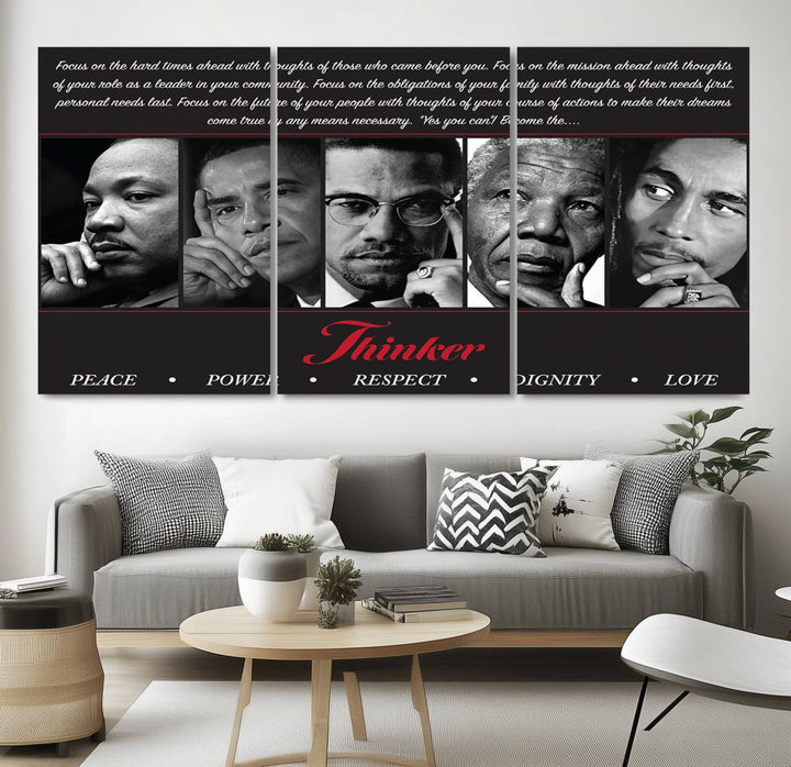 The wall art is a black and white piece featuring iconic figures accompanied by the words Thinker Peace Power Respect Dignity.