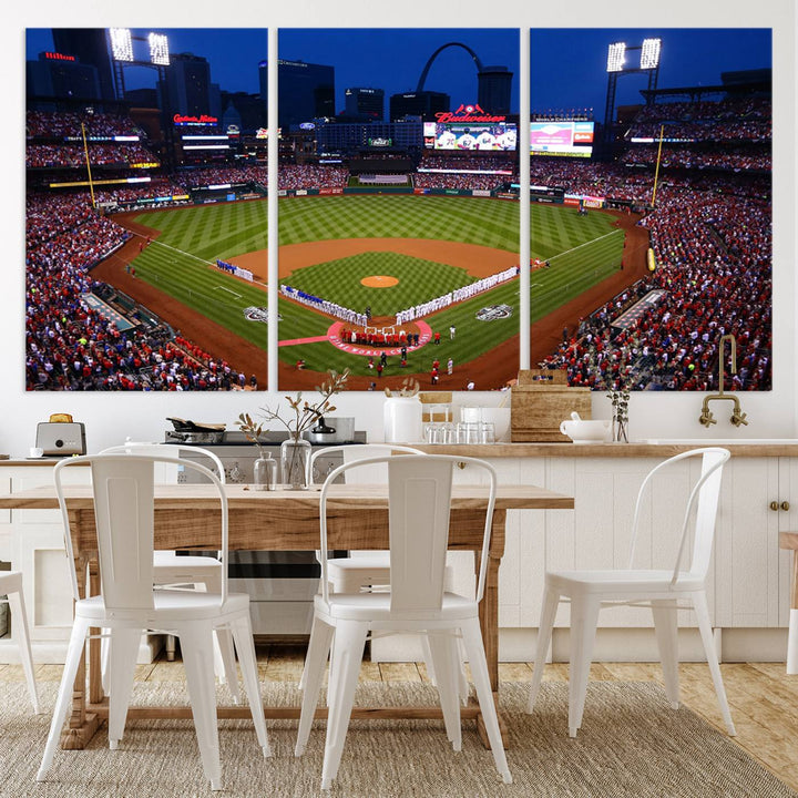 A Cardinals wall art canvas print depicts Busch Stadium with players lined up on the field and a full audience under the lights, capturing the vibrant atmosphere.