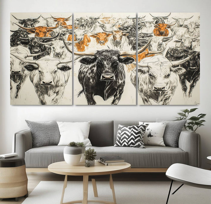 This exquisite farmhouse wall art, titled "Western Longhorn Cattle Canvas Print," showcases a majestic herd of longhorn cattle in a three-panel design. This ready-to-hang and framed barn decor infuses your space with rustic charm.