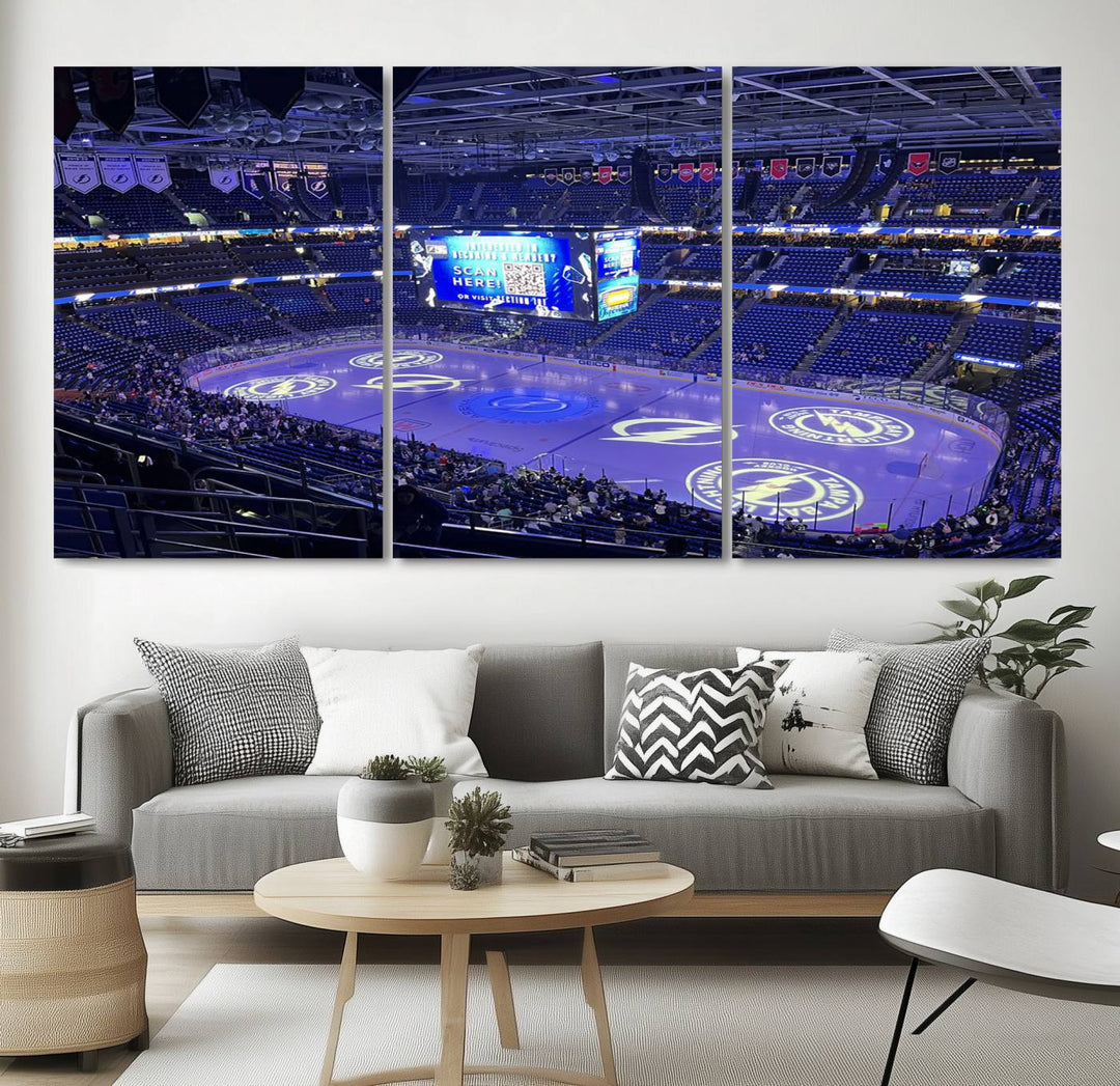 The wall art canvas print at Amalie Arena features team logos on ice, encapsulating the vibrant atmosphere of an NHL hockey stadium.