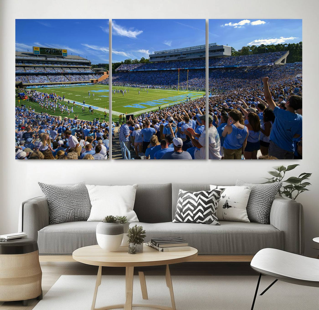 A gallery-quality canvas wall art print featuring the University of North Carolina Tar Heels Football Team and Chapel Hill's Kenan Memorial Stadium adorns the cafe wall.