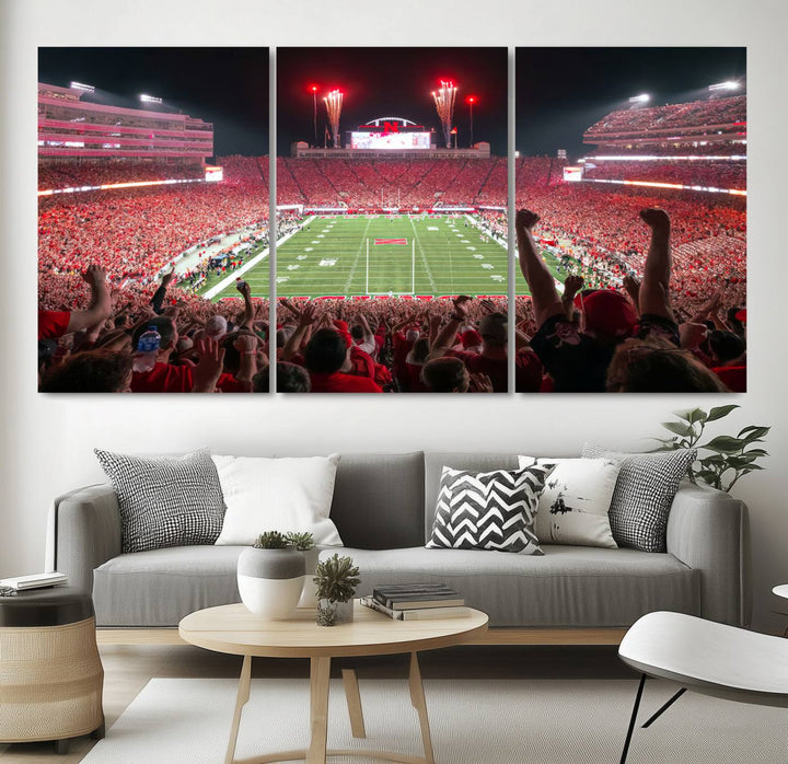 The University of Nebraska Cornhuskers Football Team Print, a vibrant three-panel canvas depicting Lincoln Memorial Stadium filled with enthusiastic fans from the end zone perspective, features a gallery-quality finish.