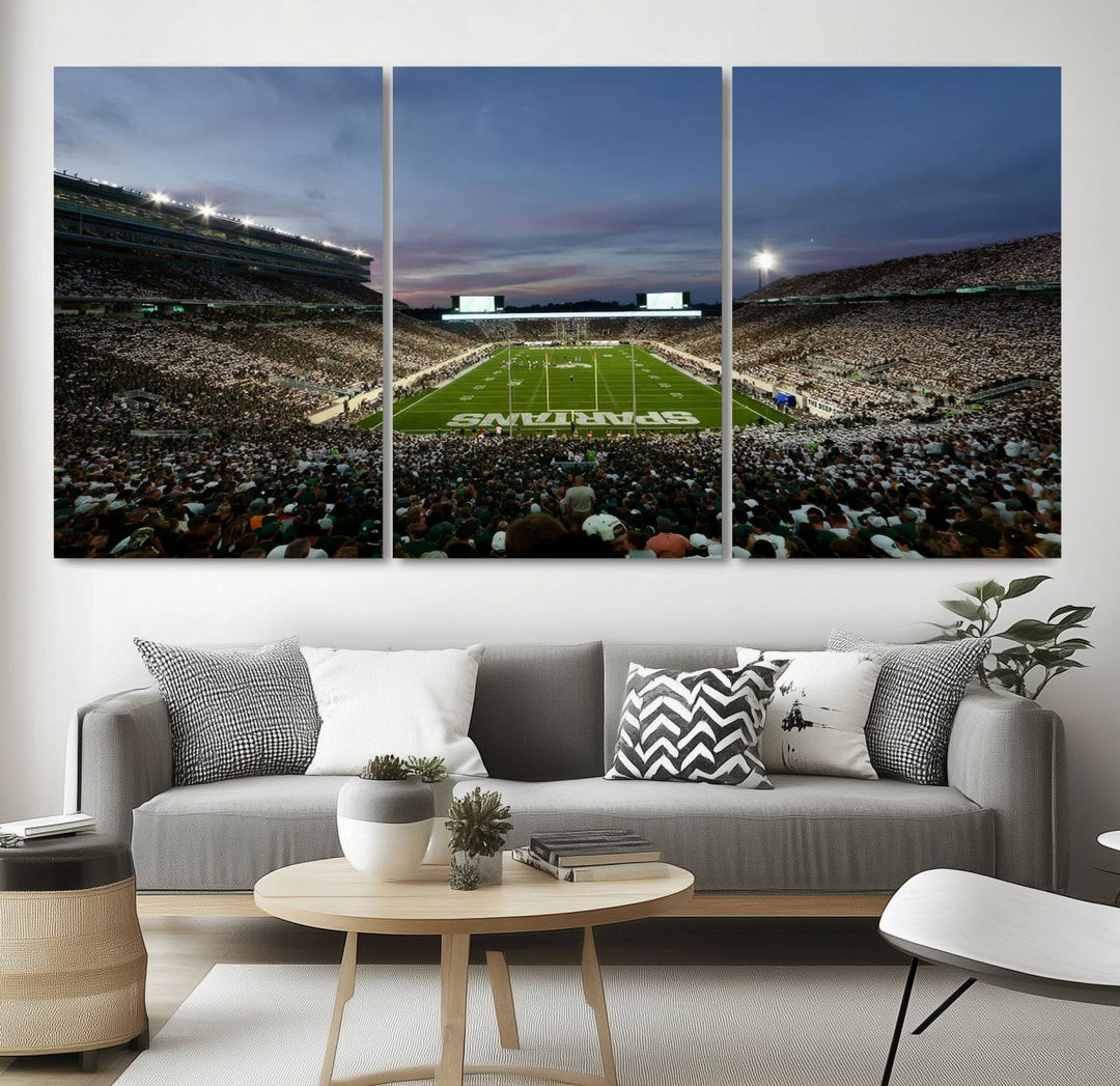 Wall art featuring a stadium at dusk with full stands—ideal for the Michigan State Spartans Football Team Canvas Print.