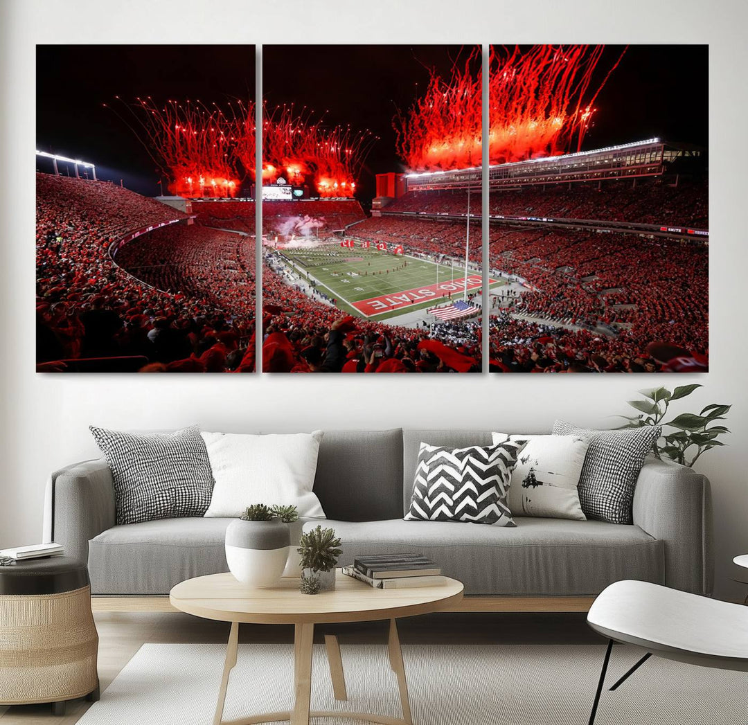 A vibrant red canvas art of a packed Ohio State Buckeyes stadium at night with fireworks.