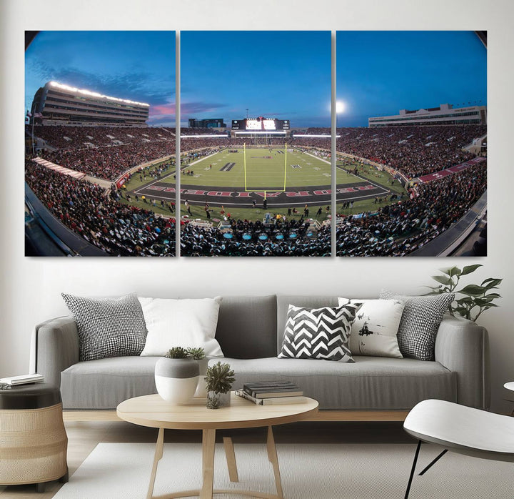 The wall art in the living room features a Texas Tech Red Raiders Football Team Print, showcasing Jones AT&T Stadium at dusk.