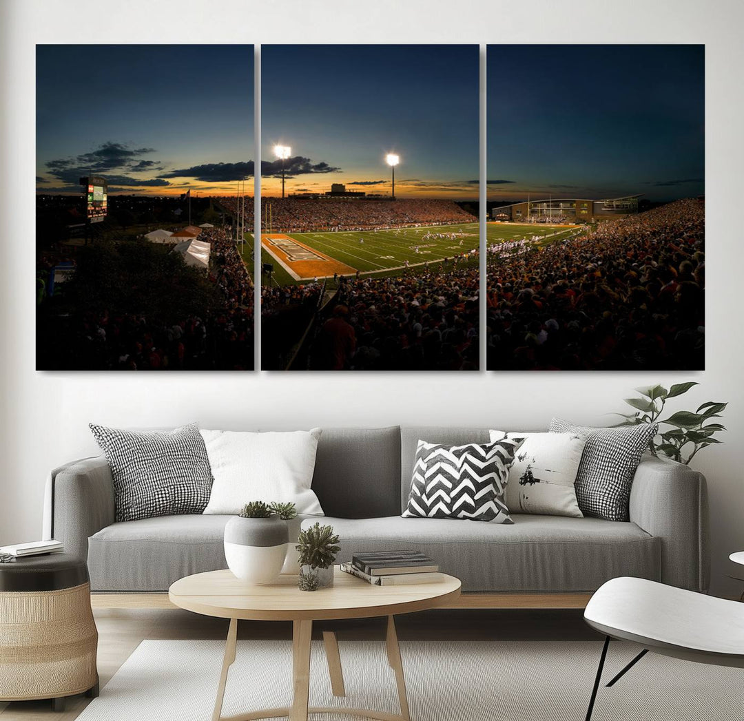 Ball State Cardinals Football Team Print - Muncie Scheumann Stadium Canvas featuring a sunset, floodlights, and lively crowd.