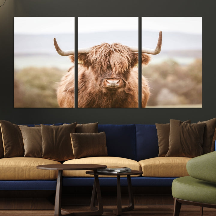 Canvas wall art featuring a Highland cow with long, shaggy fur in natural pastel tones, ready to hang.