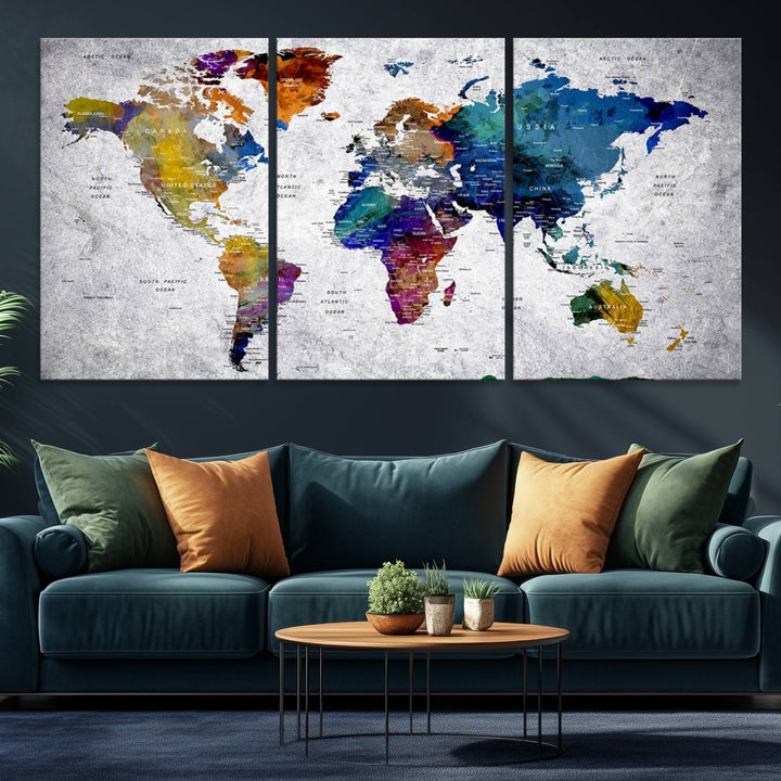 The World Map Art Canvas Print, featuring country names on a grunge-stained gray background, is perfect for stylish home decor.