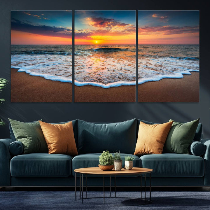 A Sunset with Calm Waves on the Beach Wall Art Canvas Print adorns the dining room.