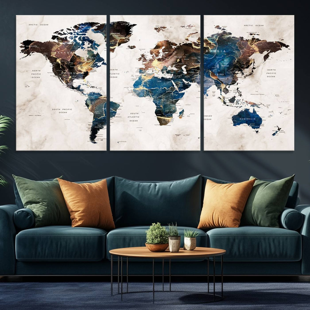 Abstract earth-toned 3-panel world map wall art featuring blues and browns, ready to hang; it showcases continents on modern canvas.