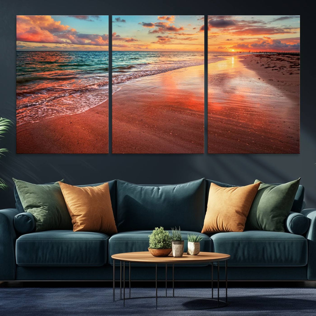 A Vibrant Sunset Beach Canvas Print with ocean waves and sandy shoreline enhances coastal-themed interiors.