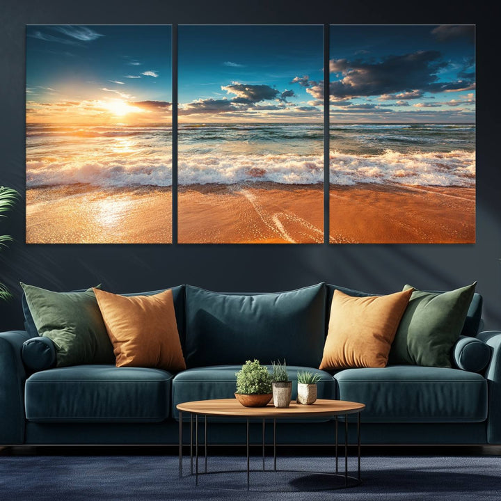 A Golden Sunset Beach Triptych Canvas Art hangs on a white wall.