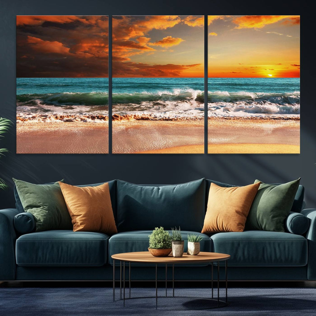 A Golden Sunset Beach triptych seascape canvas hangs on the wall.