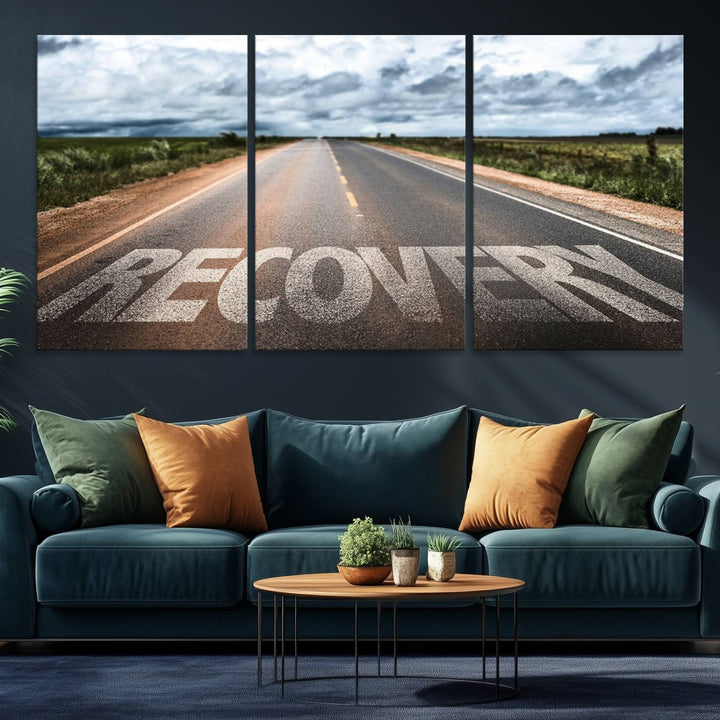 The Recovery Road Wall Art Canvas Print depicts a road under a cloudy horizon.