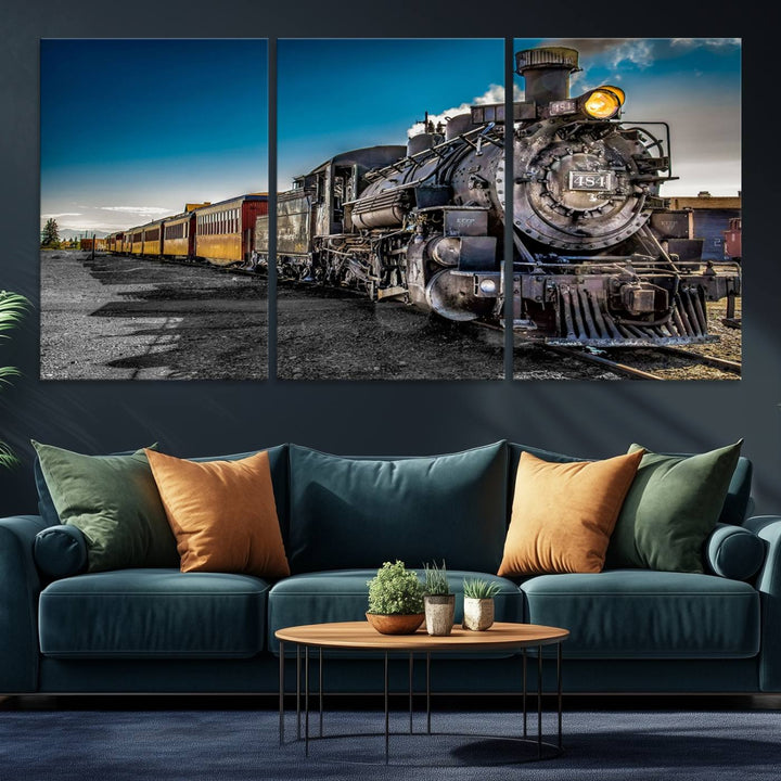 The Train Wall Art Canvas Print features a vintage steam train with a bright headlight.