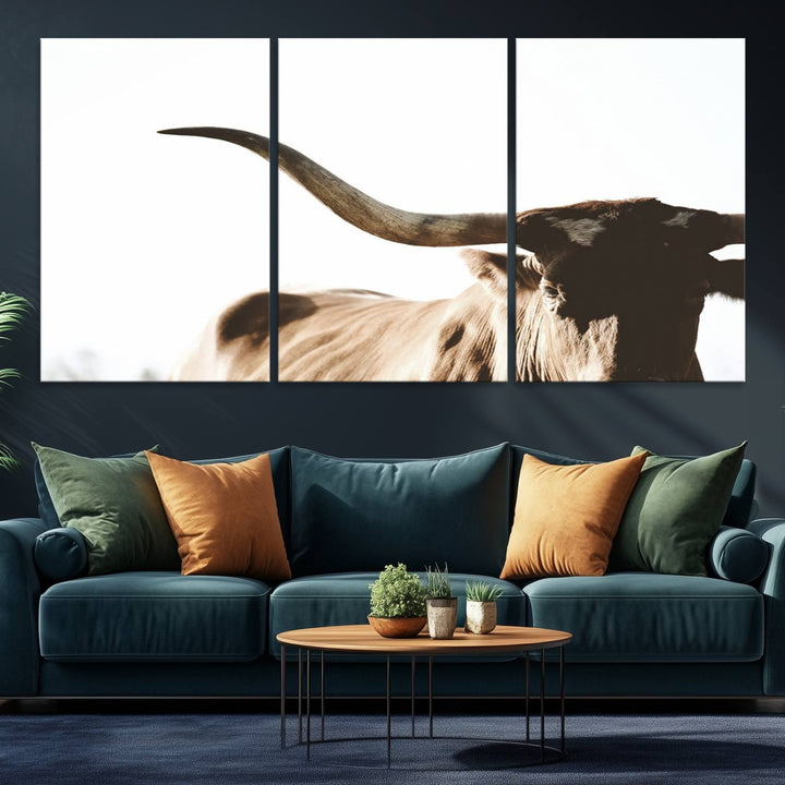 A 3-panel Texas Longhorn canvas adds a touch of rustic Western decor.