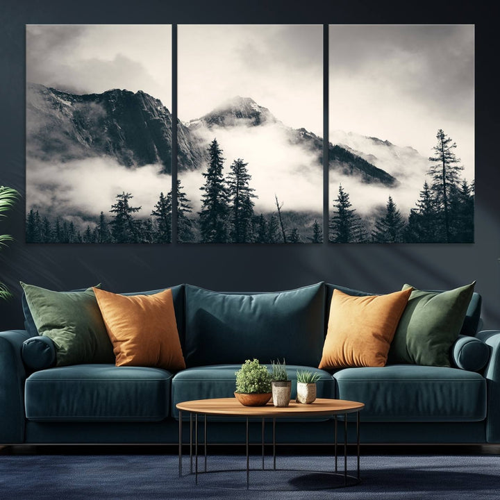 A large foggy mountain forest canvas print hangs prominently in the room.