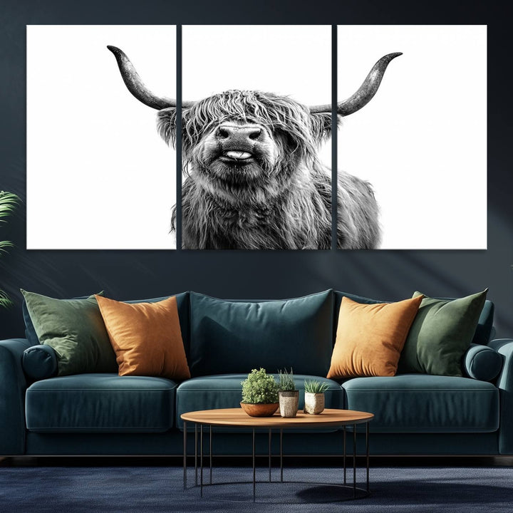 The Fanny Highland Cow art print decorates the modern kitchen, featured in black and white.