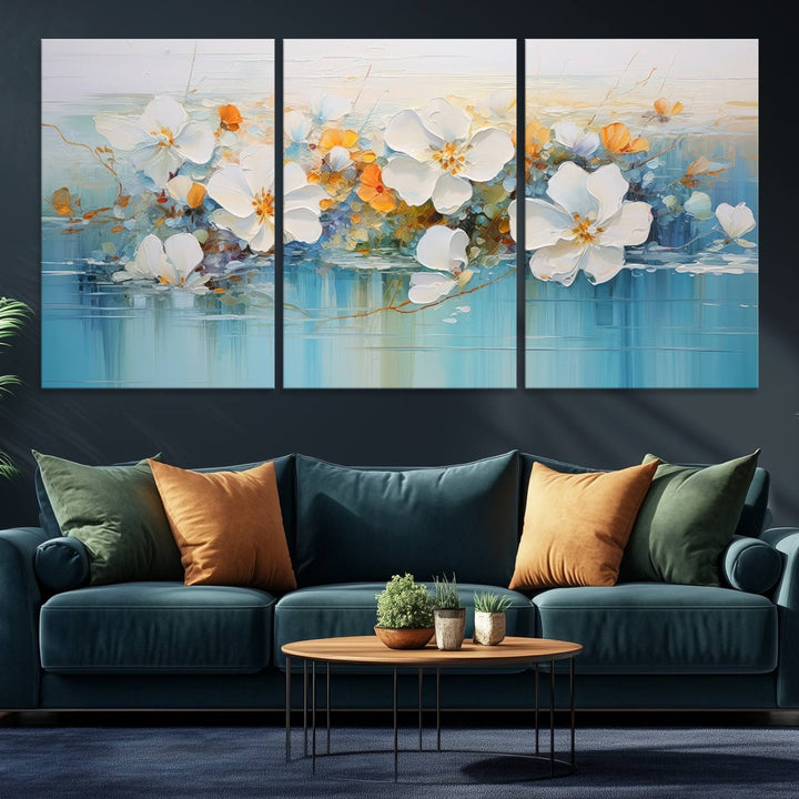 An Abstract Flower Wall Art Canvas Print in blue and orange hues.