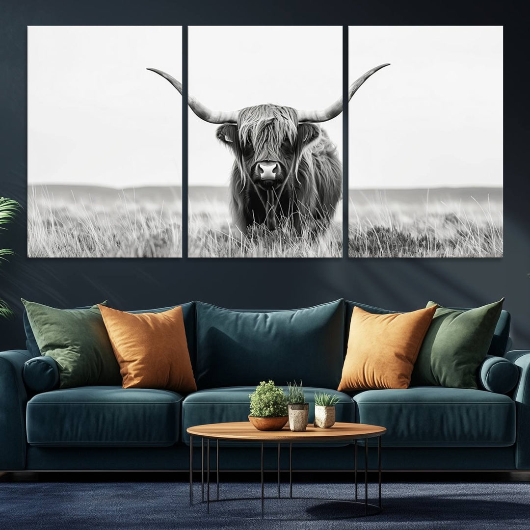 The Majestic Beauty canvas of a Highland cow adds elegance to the white walls as it hangs prominently.