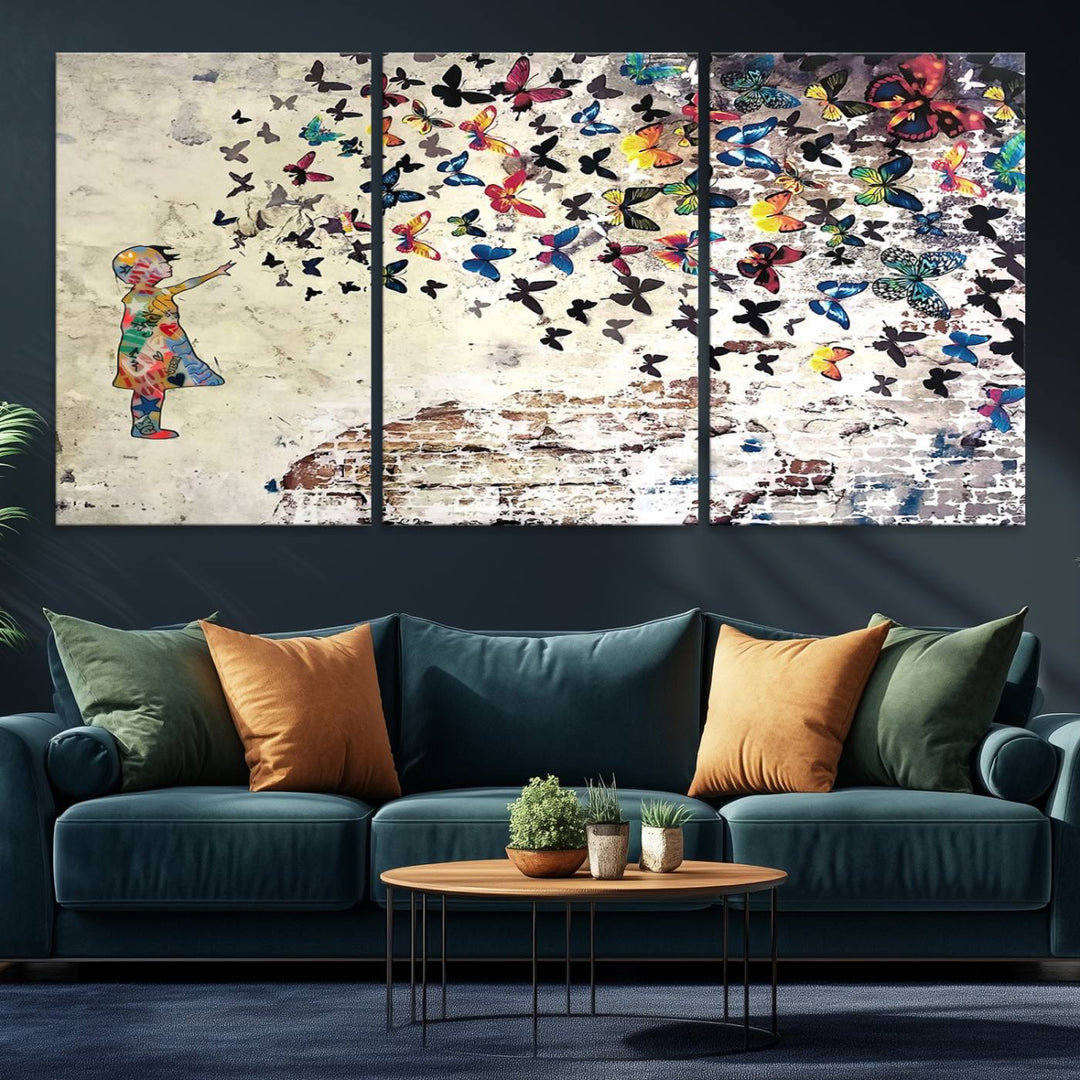 A Banksy Girl Butterfly Canvas Print is displayed on the textured wall.