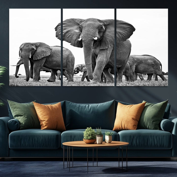 A modern dining area features a Black White Elephant Family Wall Art Canvas Print.