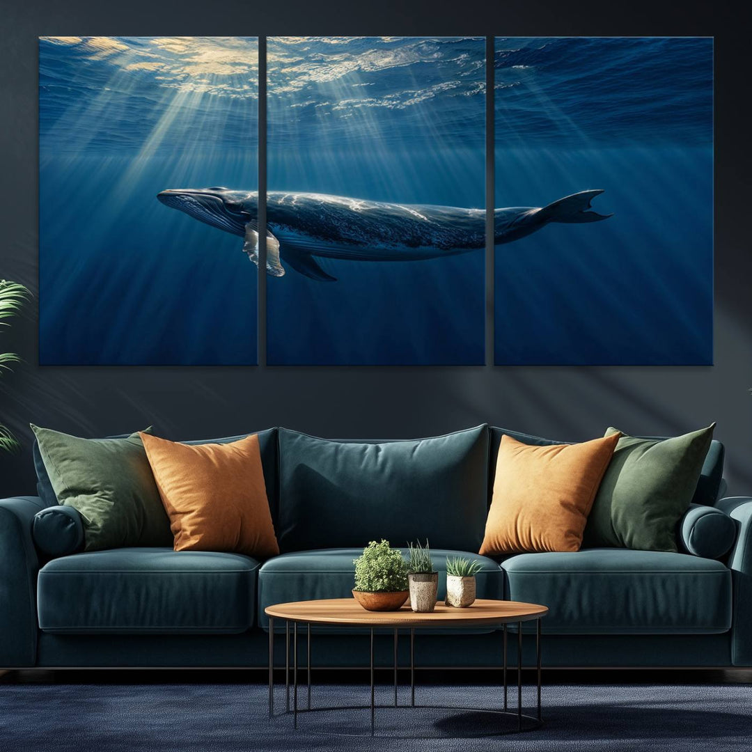 The Whale under Ocean wall art canvas print graces the white wall.